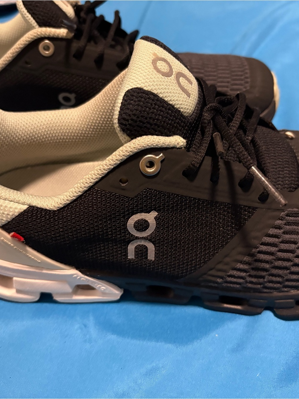 On Running women’s Athletic Trainer — Black & Cream